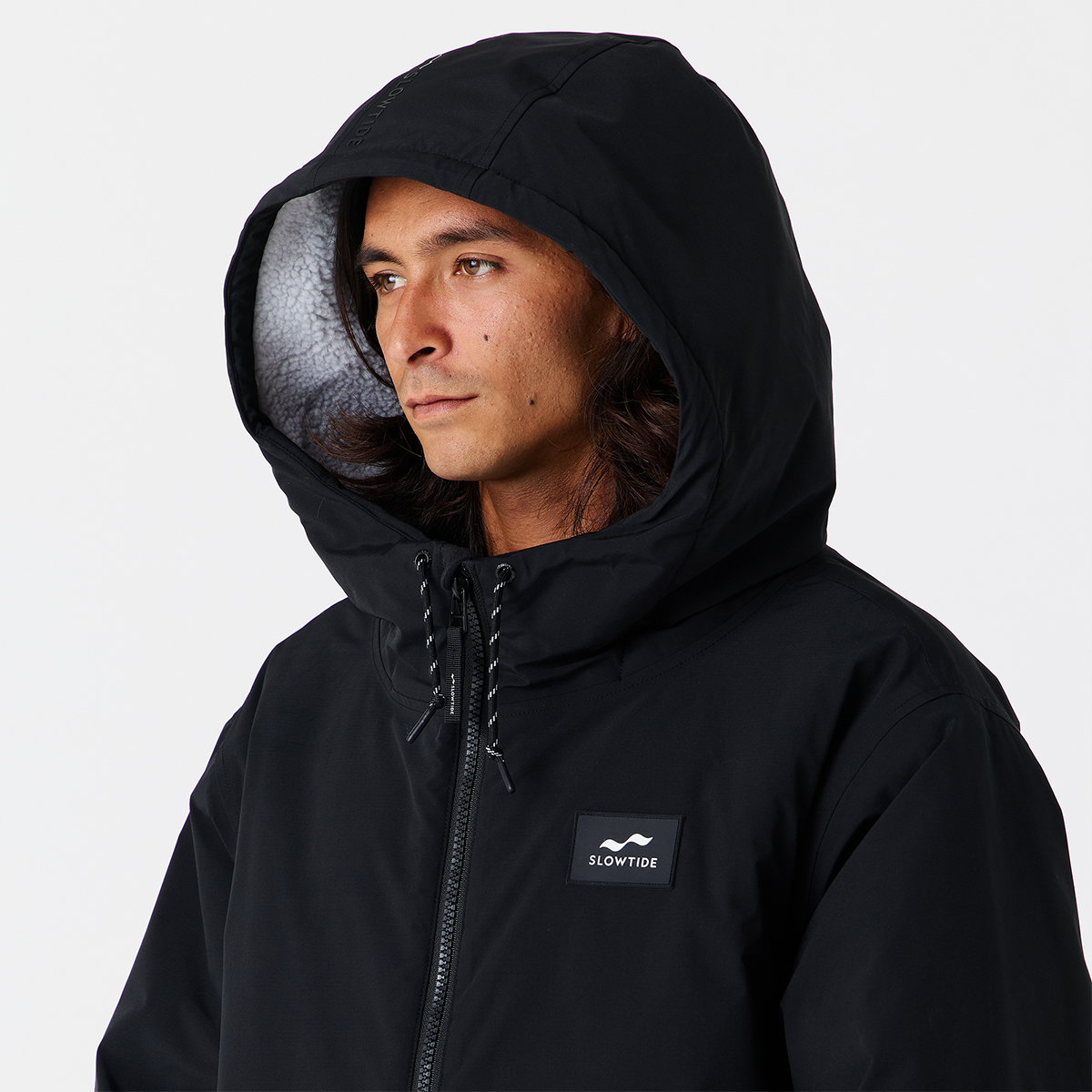 Black hooded insulated parka with side logo detail.