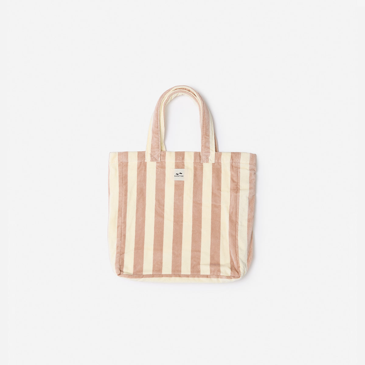 Beach bag with beige and pink vertical stripes and two handles.