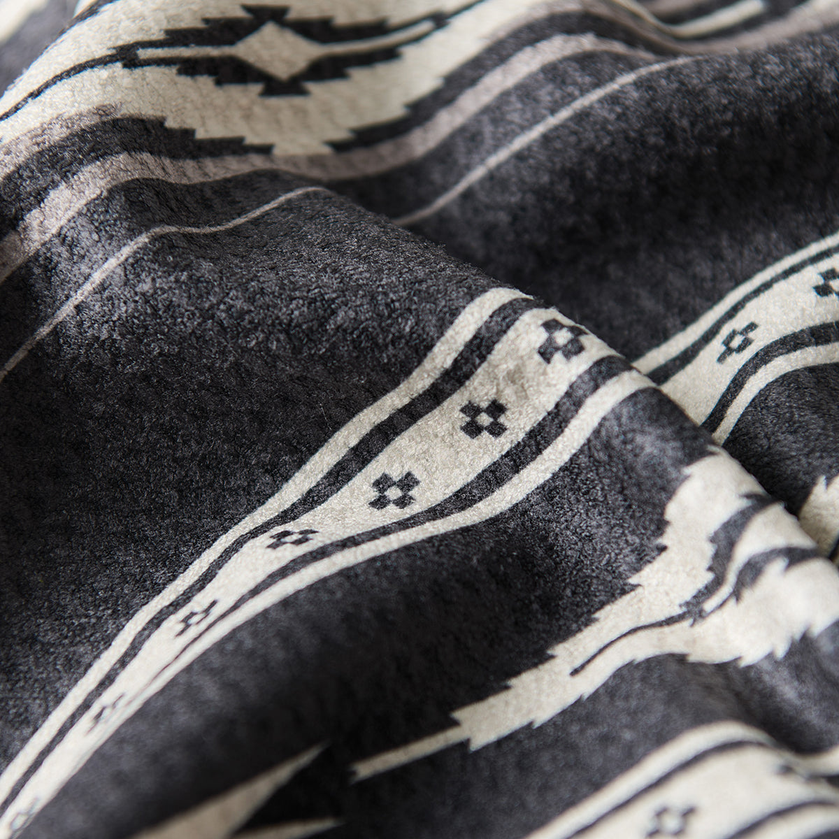 Waffle towel, recycled material, black and white geometric and floral vintage pattern.
