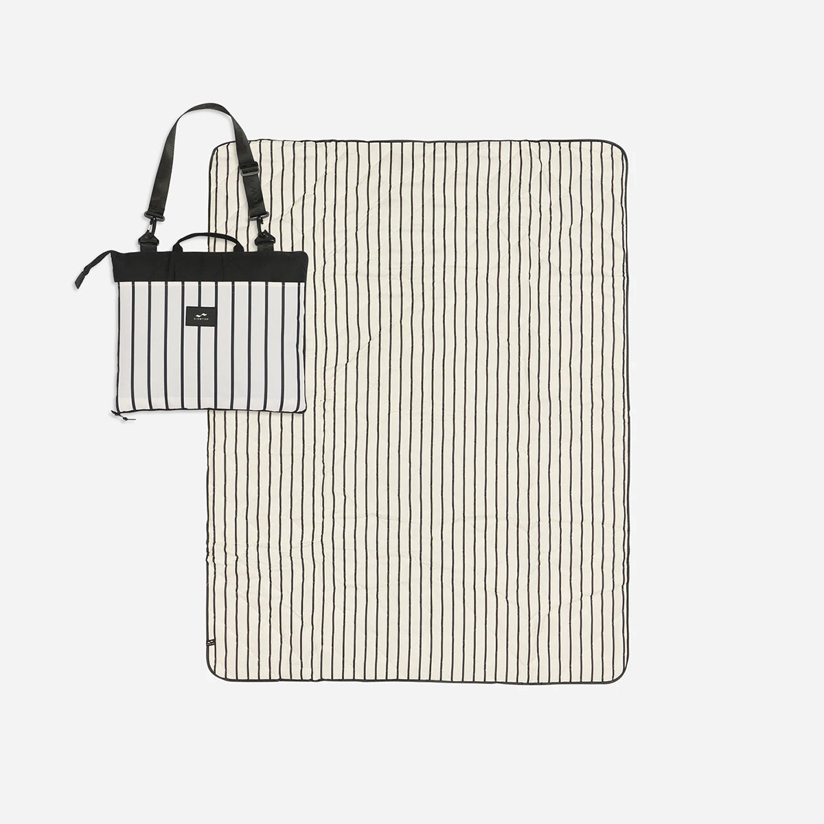 Striped mat with carrying handle, shown folded and unfolded on white background.