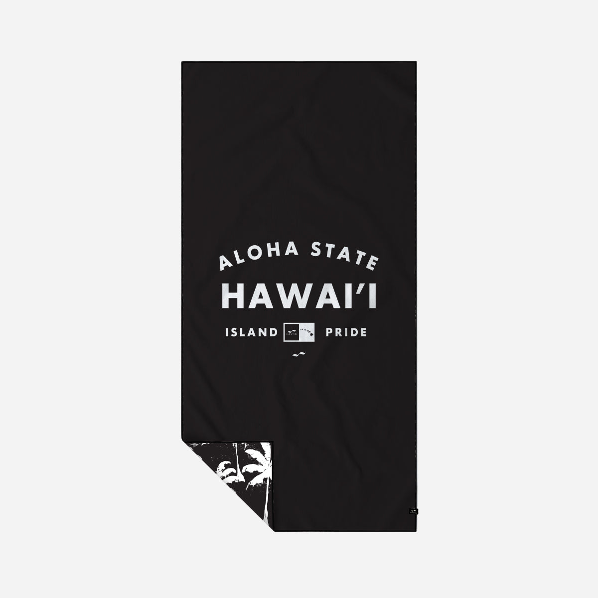 Black recycled towel with Hawaii Pride text and palm tree print on one corner.