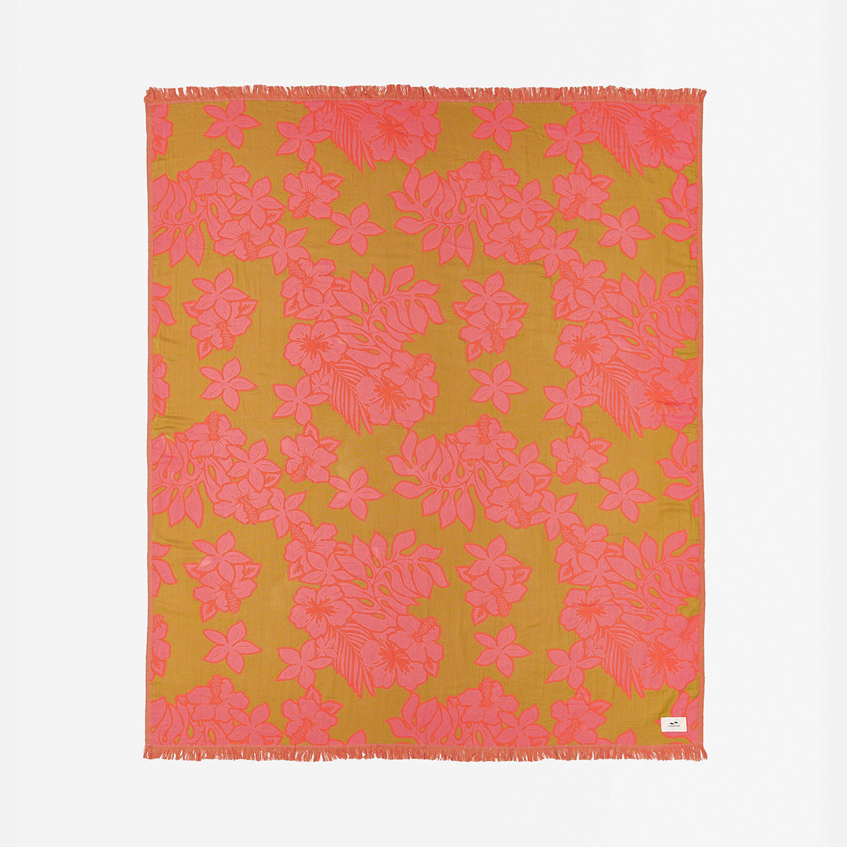 Beach towel, lightweight fabric with pink floral pattern and fringed edges displayed flat.