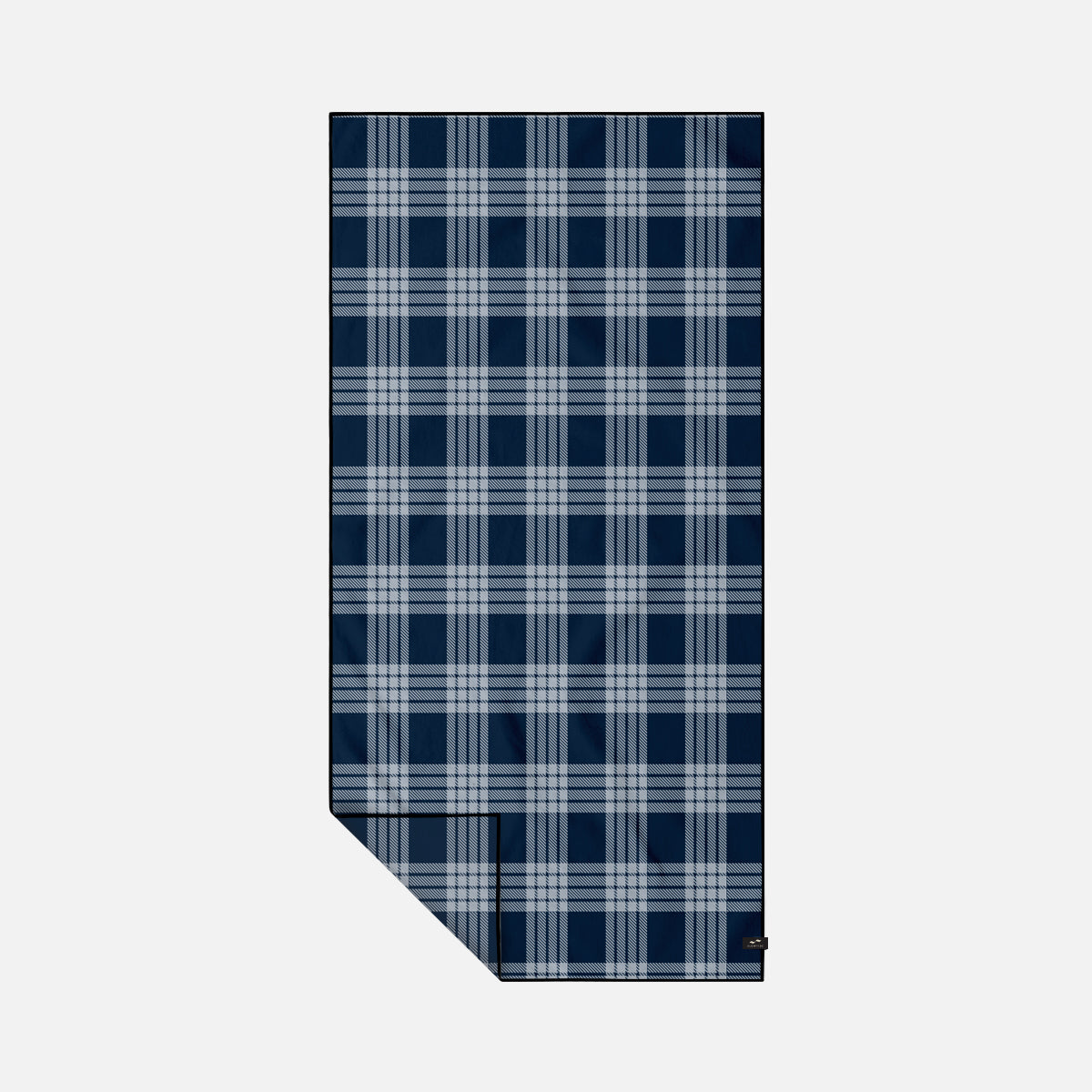 Quick dry towel with blue and white plaid pattern laid flat.