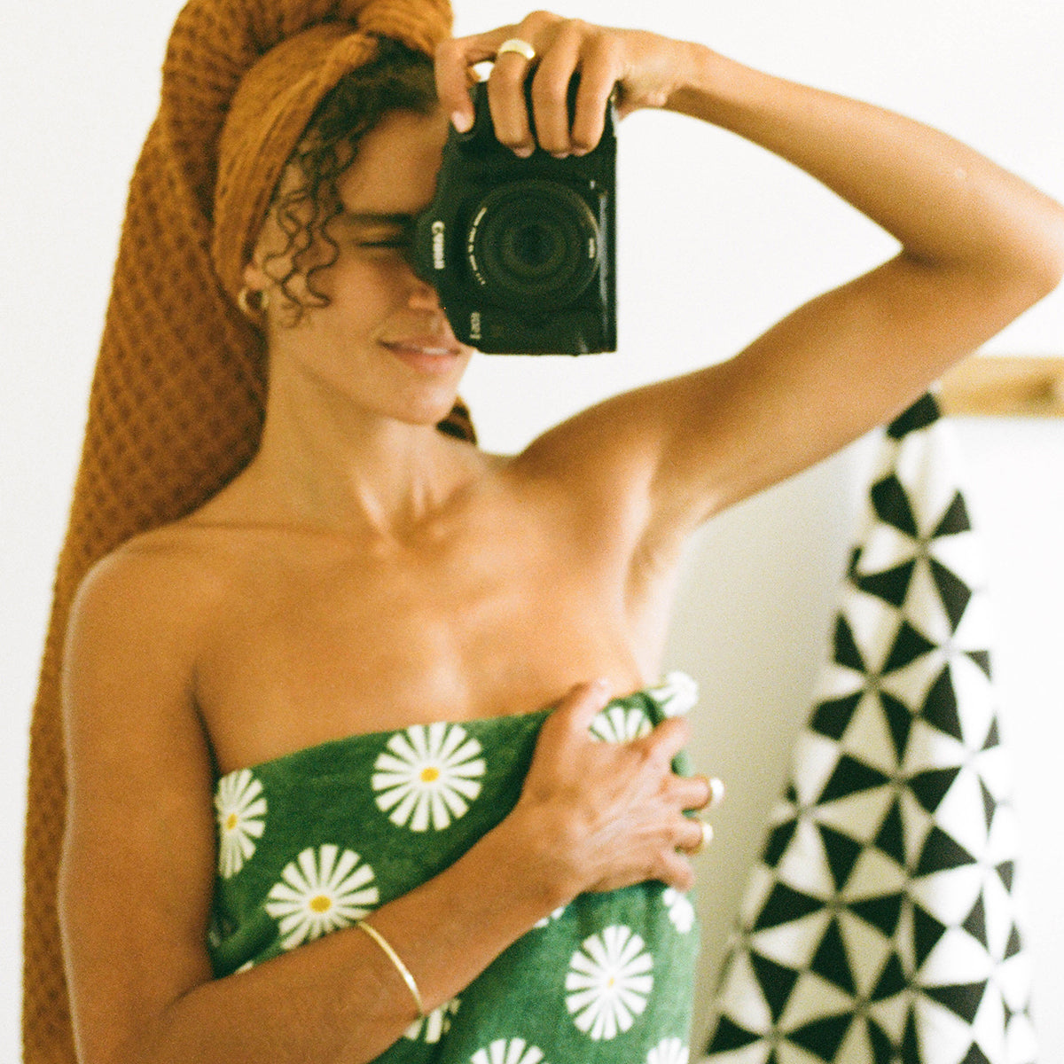 Cotton towel wrap in absorbent fabric for hair, shown on head for bathroom use.