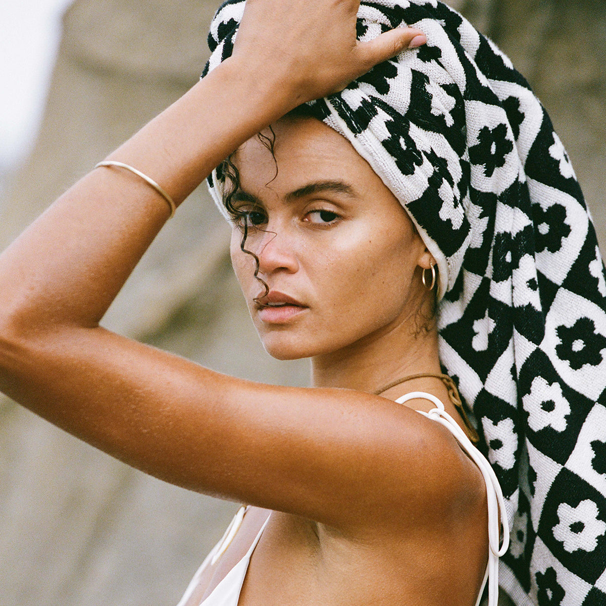 Bath towel with floral print.