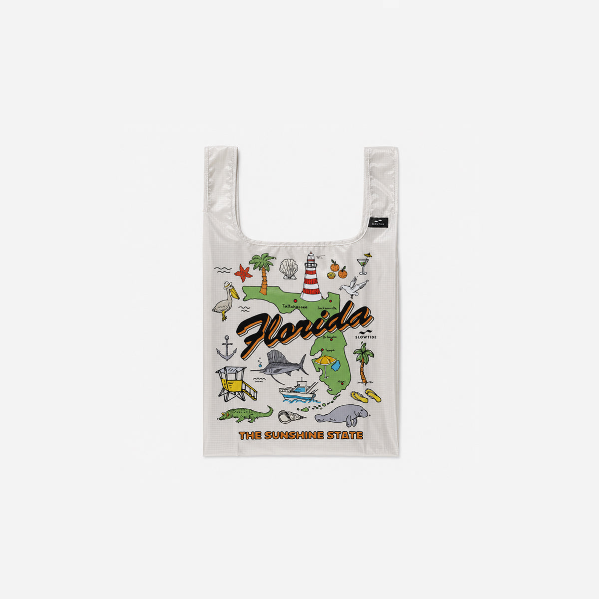 Tote bag in recycled nylon with colorful Florida-themed print and text.