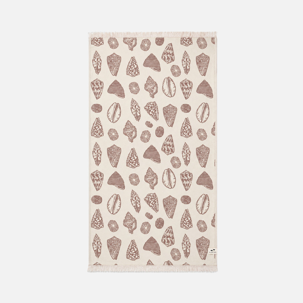 Beige sand-resistant towel with brown seashell and rock pattern on a plain background.