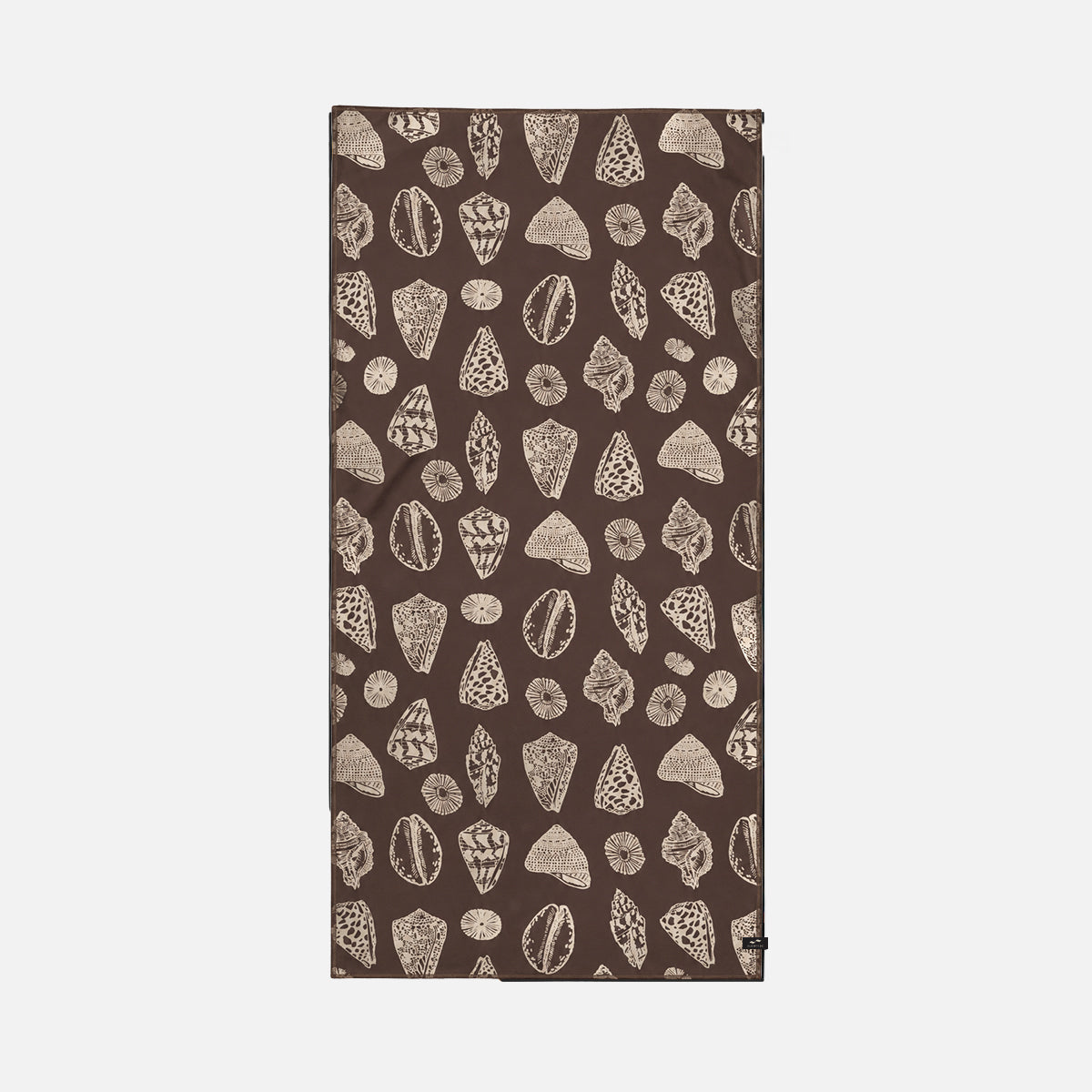 Brown sand-free towel with beige seashell pattern on white background.