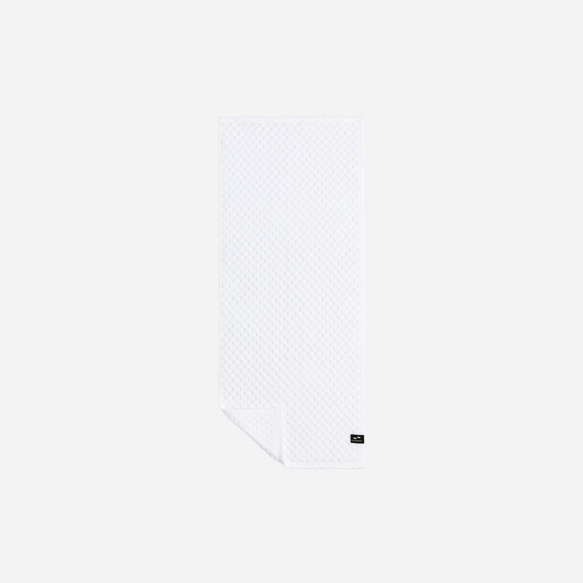 White textured spa towel, 500 GSM cotton, with small black label.