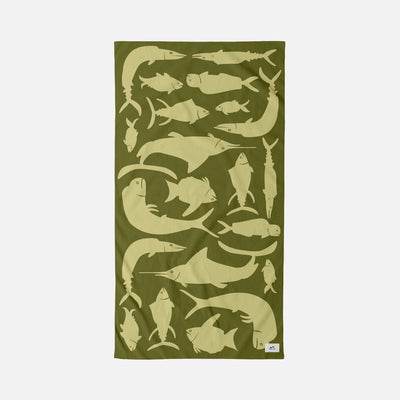 Velour towel with light green fish pattern in assorted shapes and sizes.