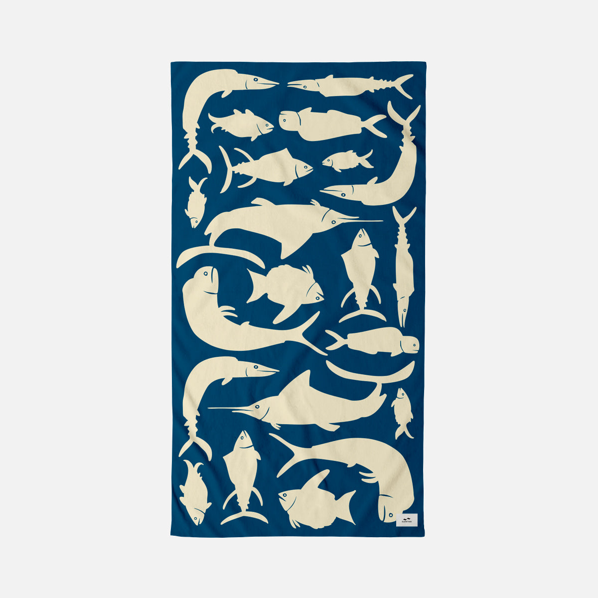 Velour cotton towel with navy blue print and cream fish pattern.