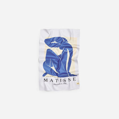 Kitchen towel with abstract blue nude print and “Blue Nu 11, 1952” text.