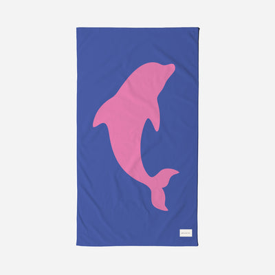 Cotton towel with pink dolphin silhouette on blue background.