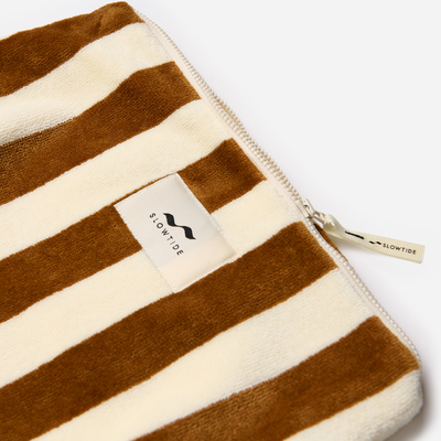 Striped cotton canvas pouch with zipper pull, brown and cream pattern on white background.