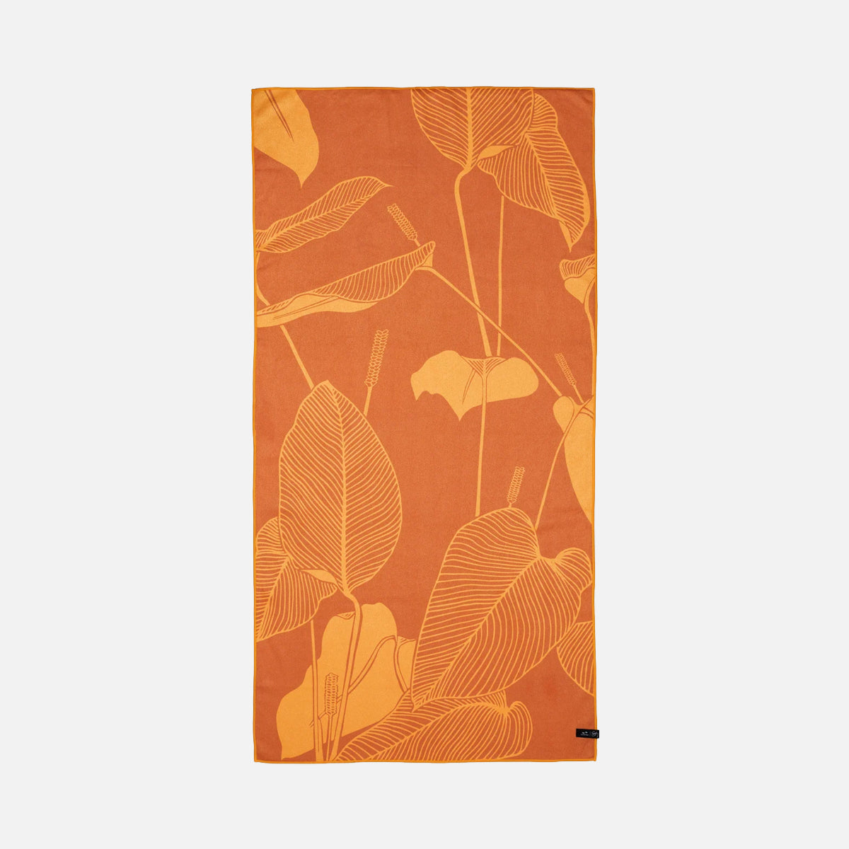 Beach towel in orange quick-dry fabric with a yellow line-art leaf print.