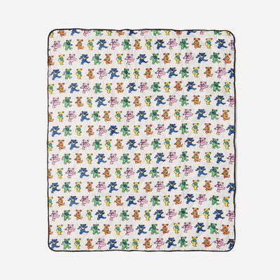 Blanket with colorful bear pattern on white, lightweight for outdoor use.