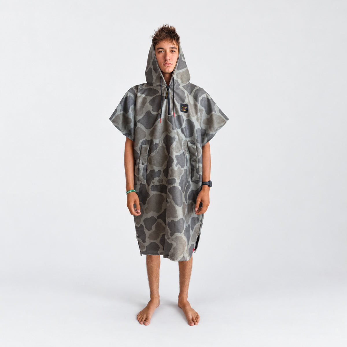 Quick-dry poncho with camo pattern.