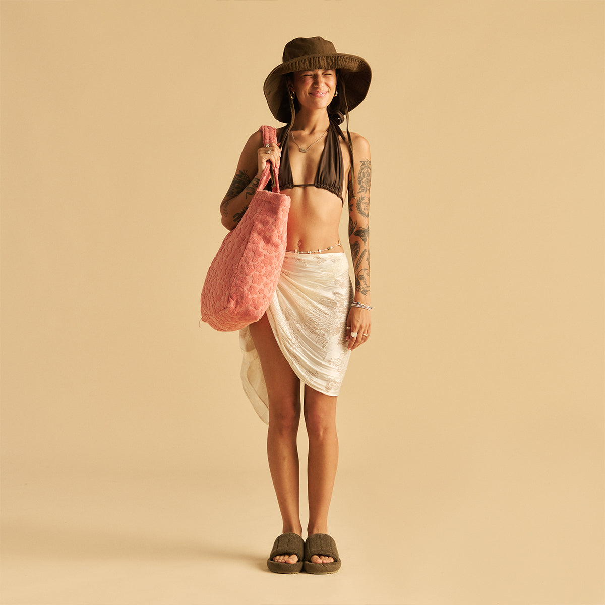Beachwear set with sun hat, sandals, and terry tote bag ensemble.