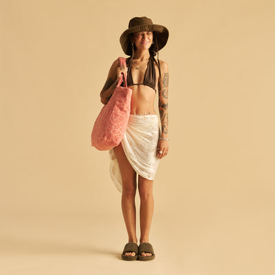 Beachwear set with sun hat, sandals, and terry tote bag ensemble.