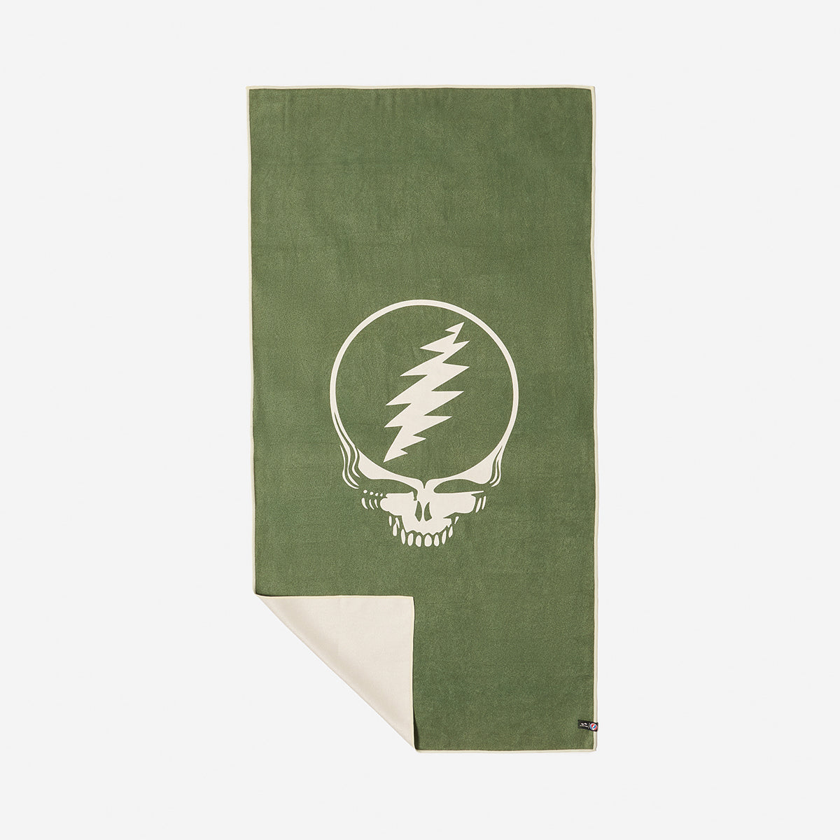 Quick-dry towel with graphic skull design, corner folded to display reverse side.