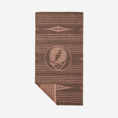 Brown recycled-material towel with lightning skull pattern.