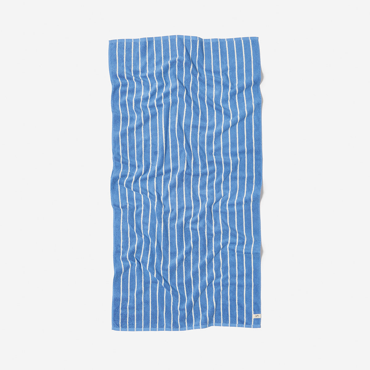 Quick dry blue towel with white vertical stripes, displayed flat.