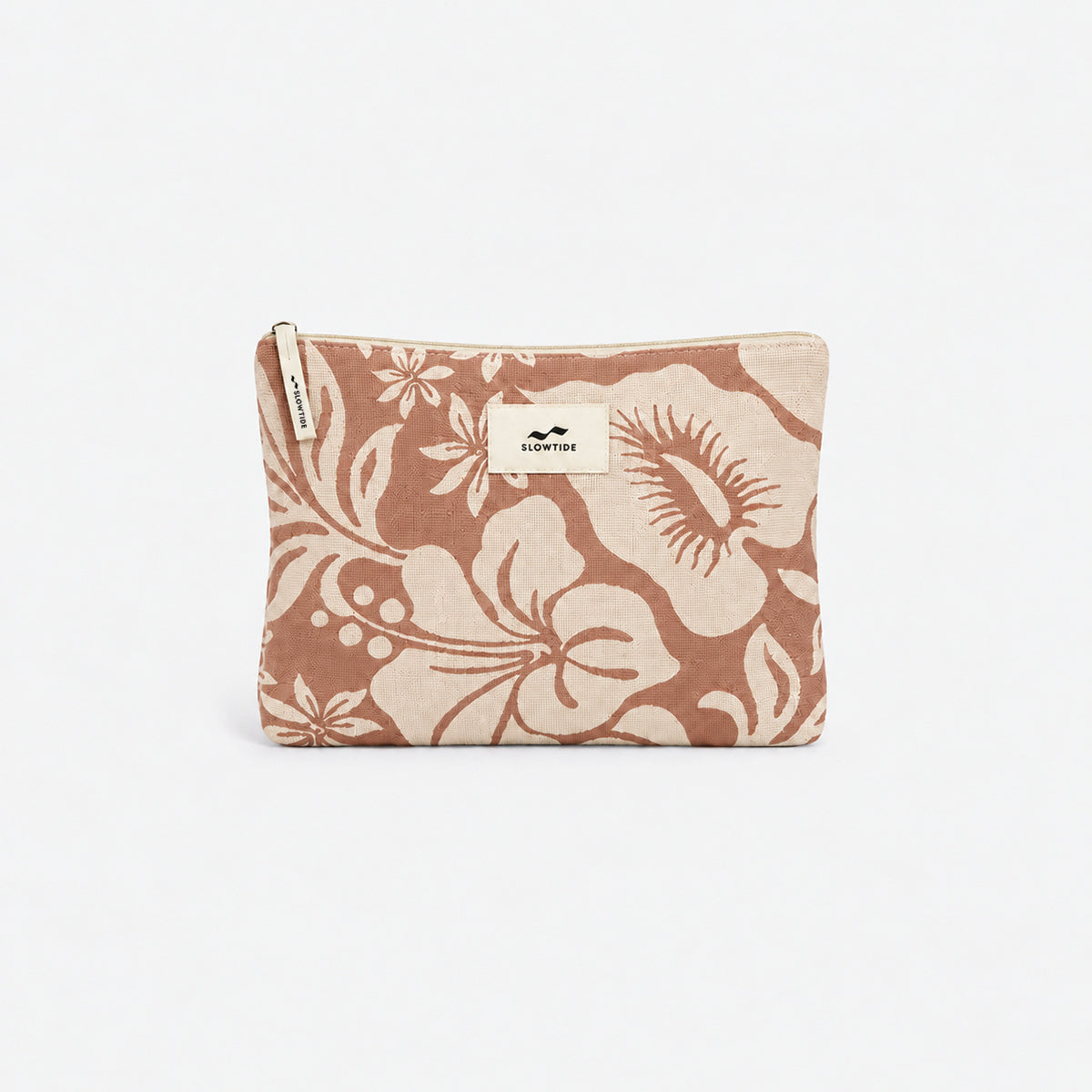Beige fabric pouch with brown floral pattern, suitable for storing towels or small items.
