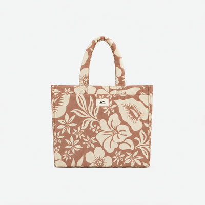 Cotton tote bag with beige floral print and two handles.