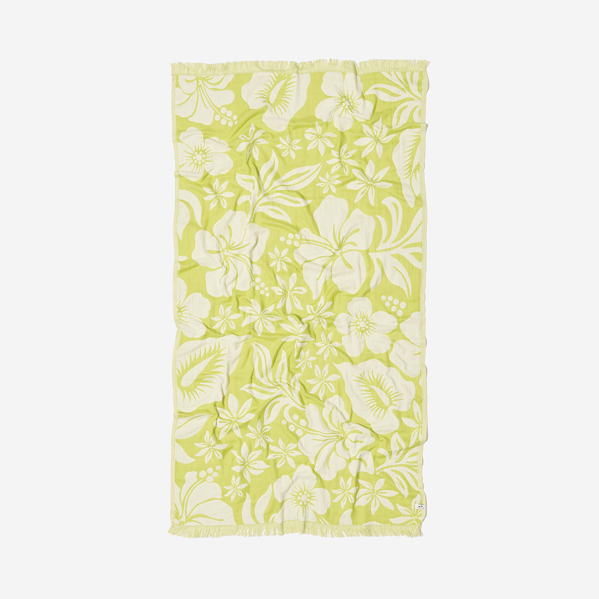 Cotton towel with yellow and white floral pattern and fringed edges.