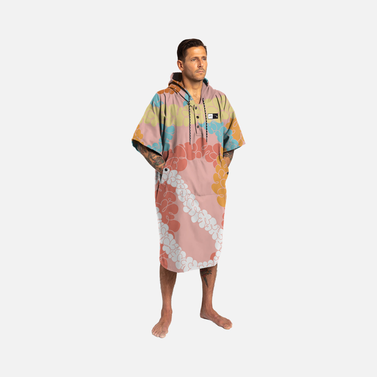 Hooded towel poncho with colorful abstract floral pattern, terry cloth.