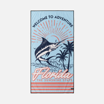 Sand-free towel with marlin, palm trees, and Florida The Sunshine State text.