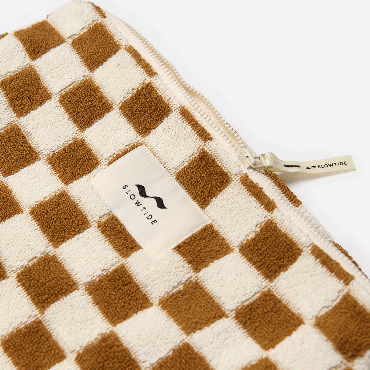Cotton canvas pouch with brown and white checkered pattern and zipper, travel organizer.