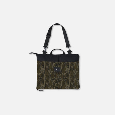 Camouflage tote bag with black handles and spacious interior for carrying essentials.