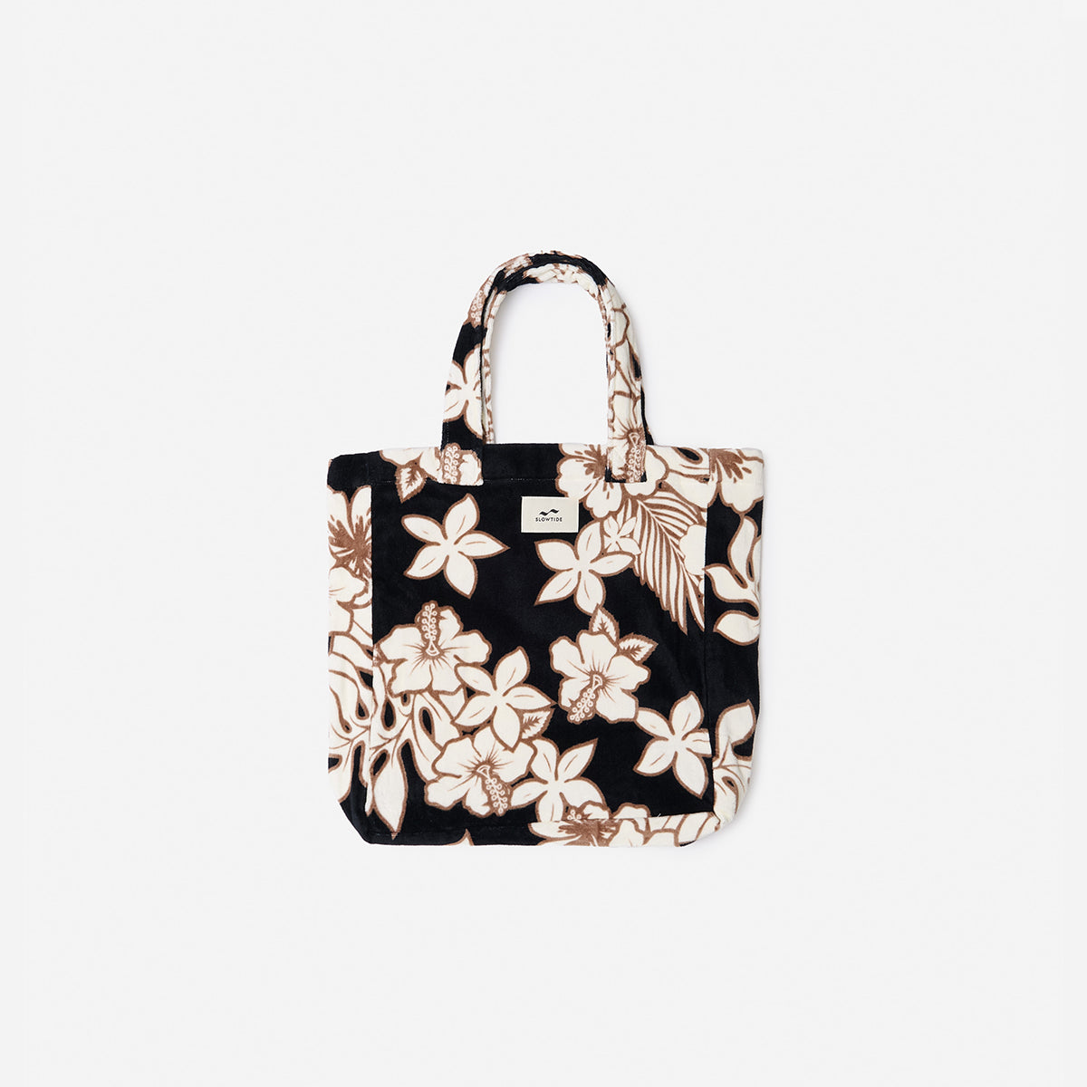 Cotton canvas tote bag, beige and brown with black floral print and handles.