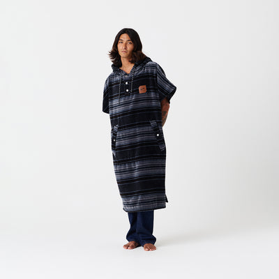 Oversized heavyweight cotton terry poncho with pockets.