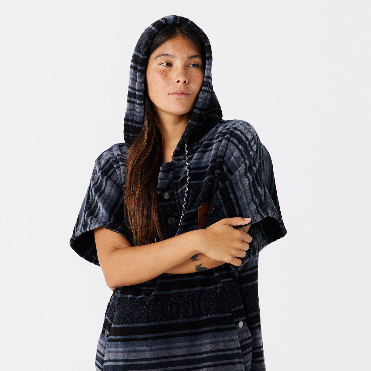 Oversized striped terry poncho in heavyweight cotton.