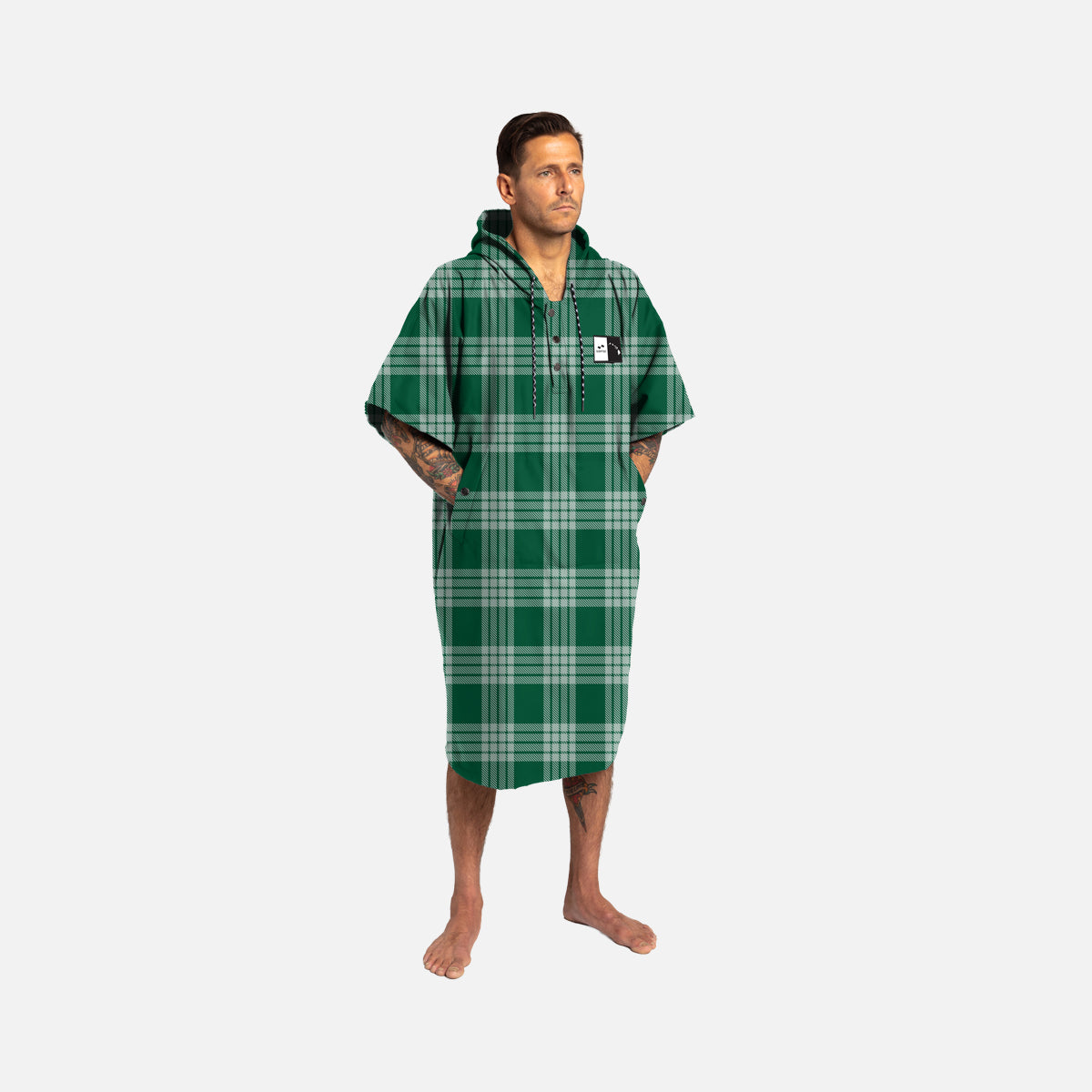 Changing poncho, green plaid, high absorbency, hood and pockets.