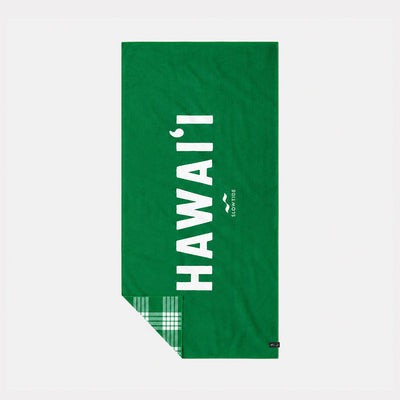 Green eco towel with HAWAII text and green plaid corner detail.