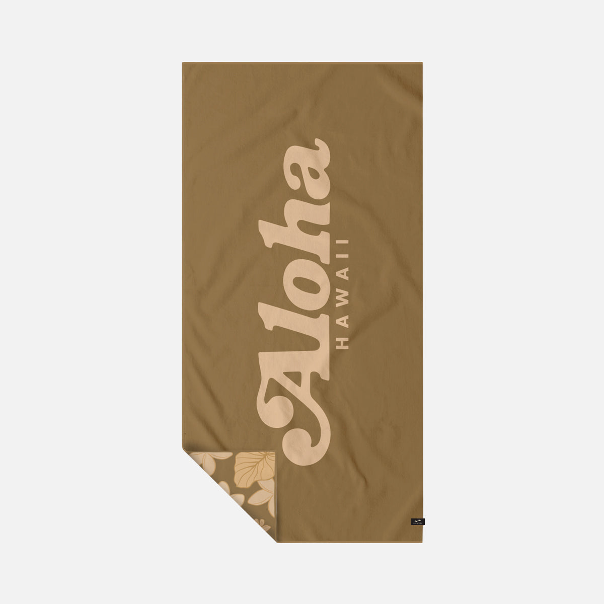 Quick-drying towel with beige floral corner pattern and Aloha Hawaii text.