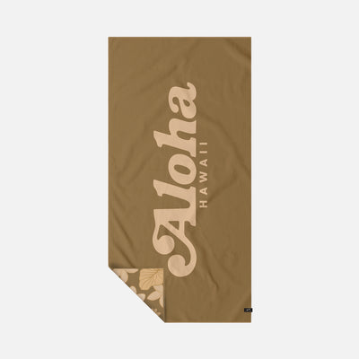 Quick-drying towel with beige floral corner pattern and Aloha Hawaii text.