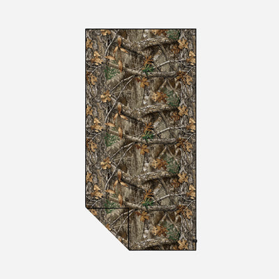 Camo towel with brown and green woodland pattern, quick-dry fabric.