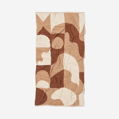 Cotton bath towel with a brown and beige geometric pattern for quick drying.
