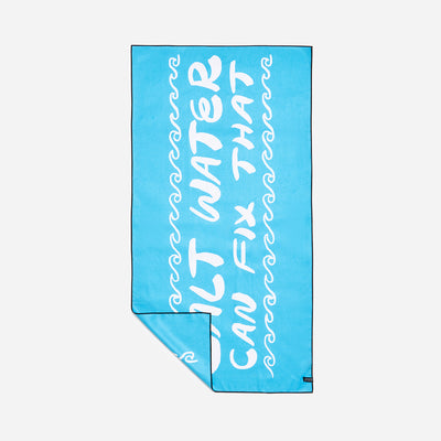 Blue quick-dry beach towel with white text, highly absorbent.