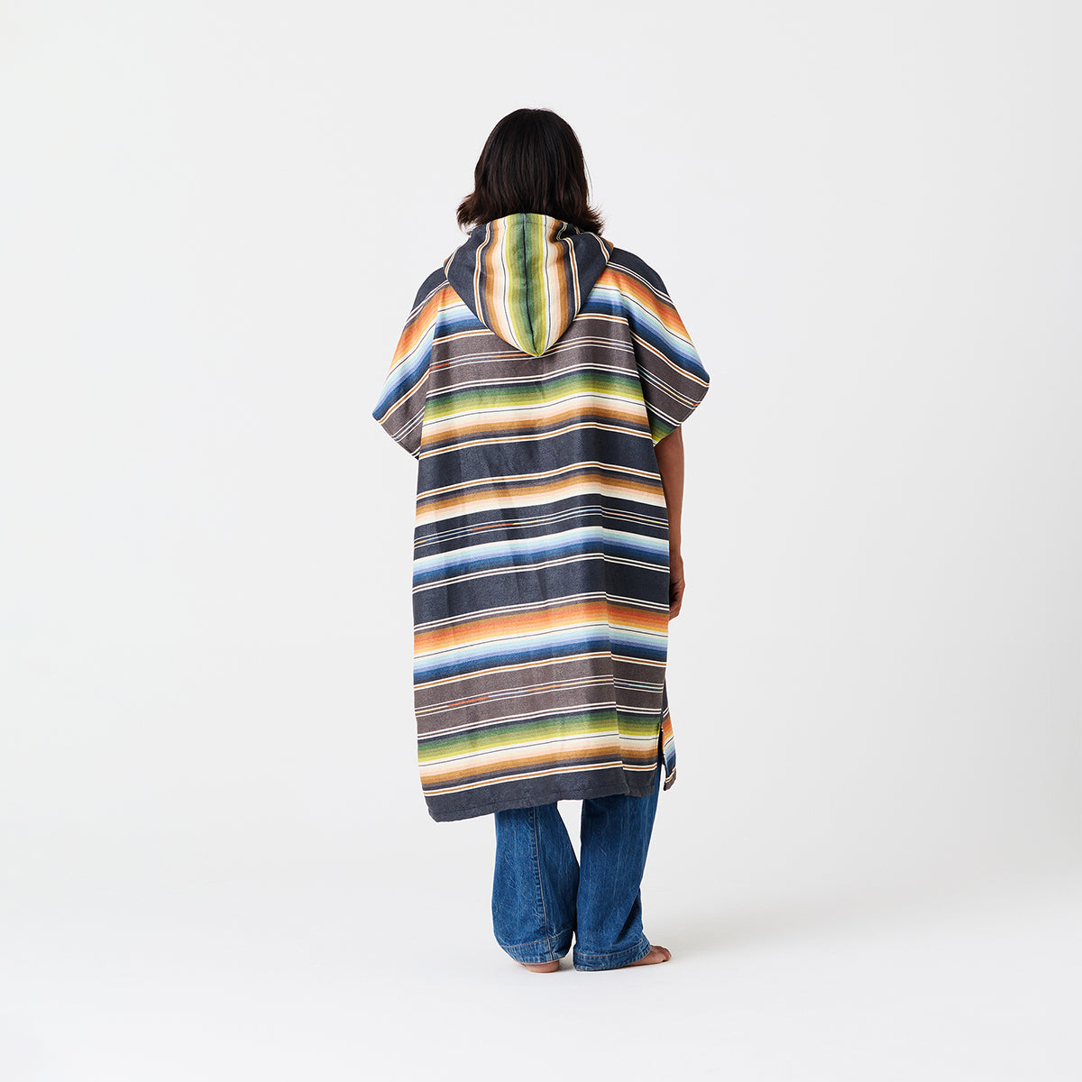 Striped quick-dry changing poncho with bold pattern, shown for surf or swimwear changing.
