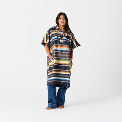 Striped quick-dry changing poncho with hood, ideal for surf or beach use.