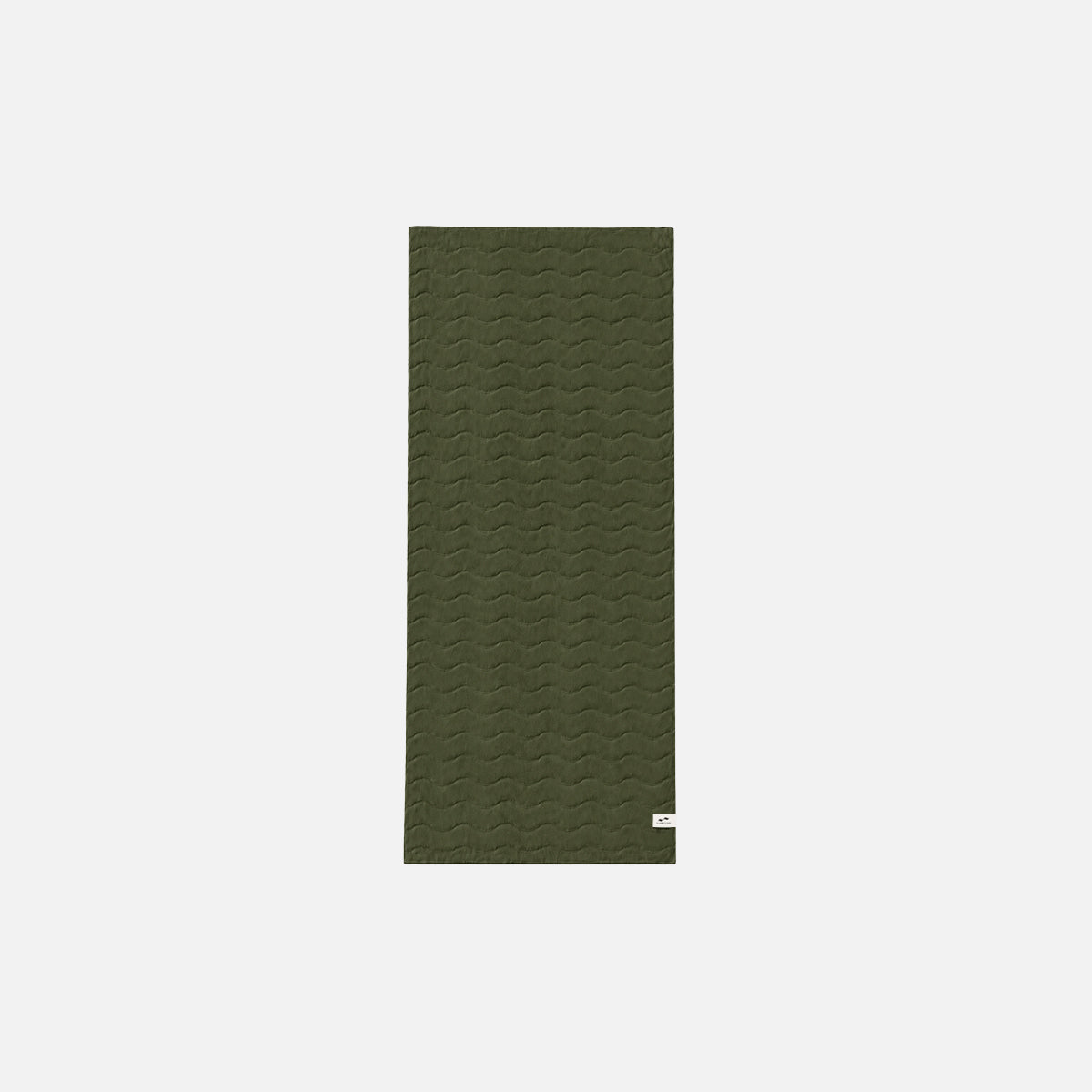 Cotton towel in olive green with wavy pattern on white background.