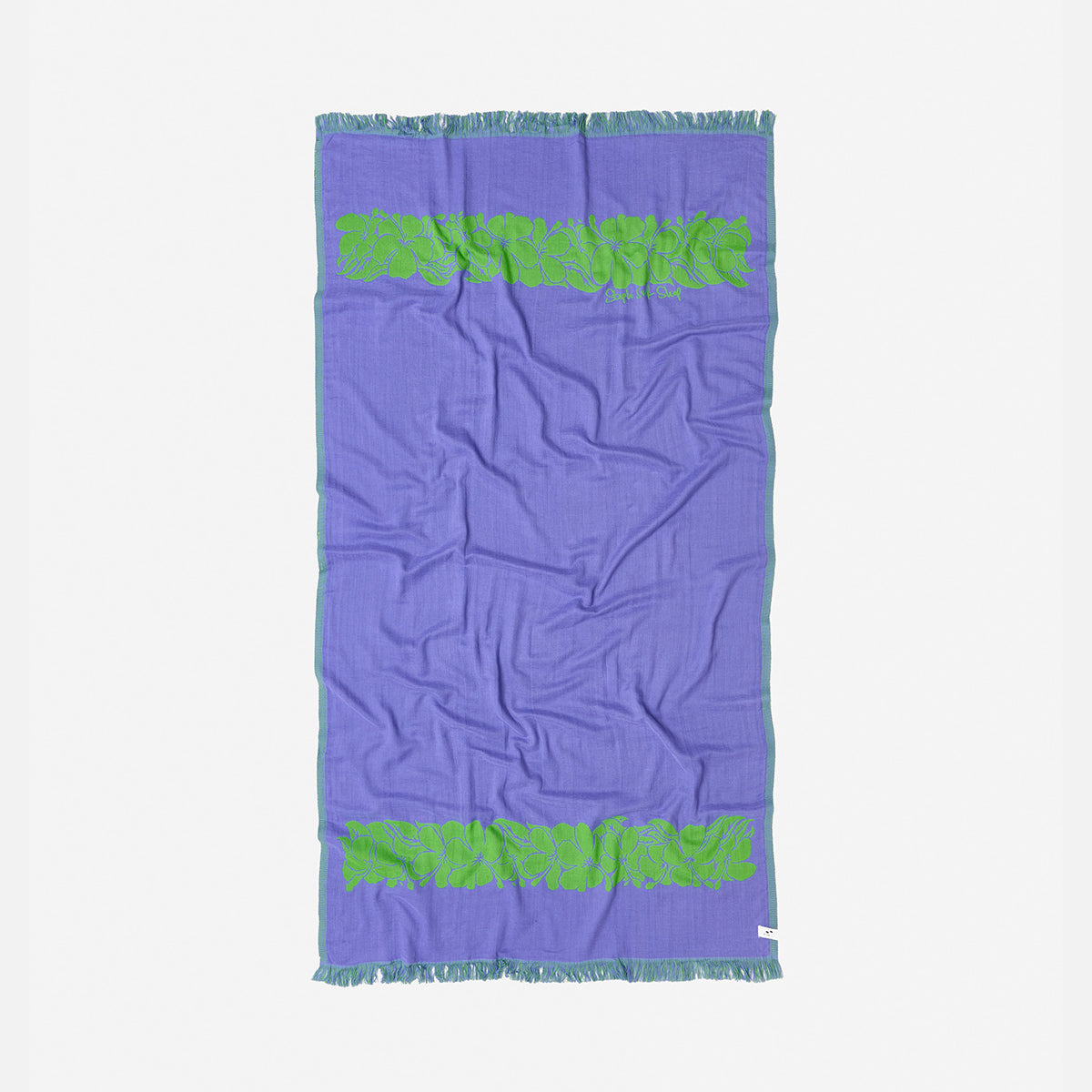 Turkish towel with purple color, green fringe, and leaf pattern, sand-resistant design.