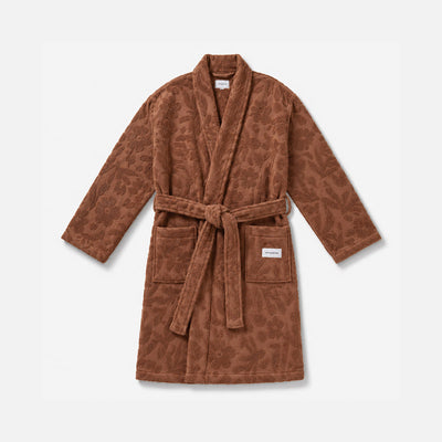 Plush brown patterned robe with belt and front pockets.