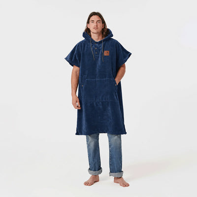 Blue absorbent towel poncho with hood and changing pocket.