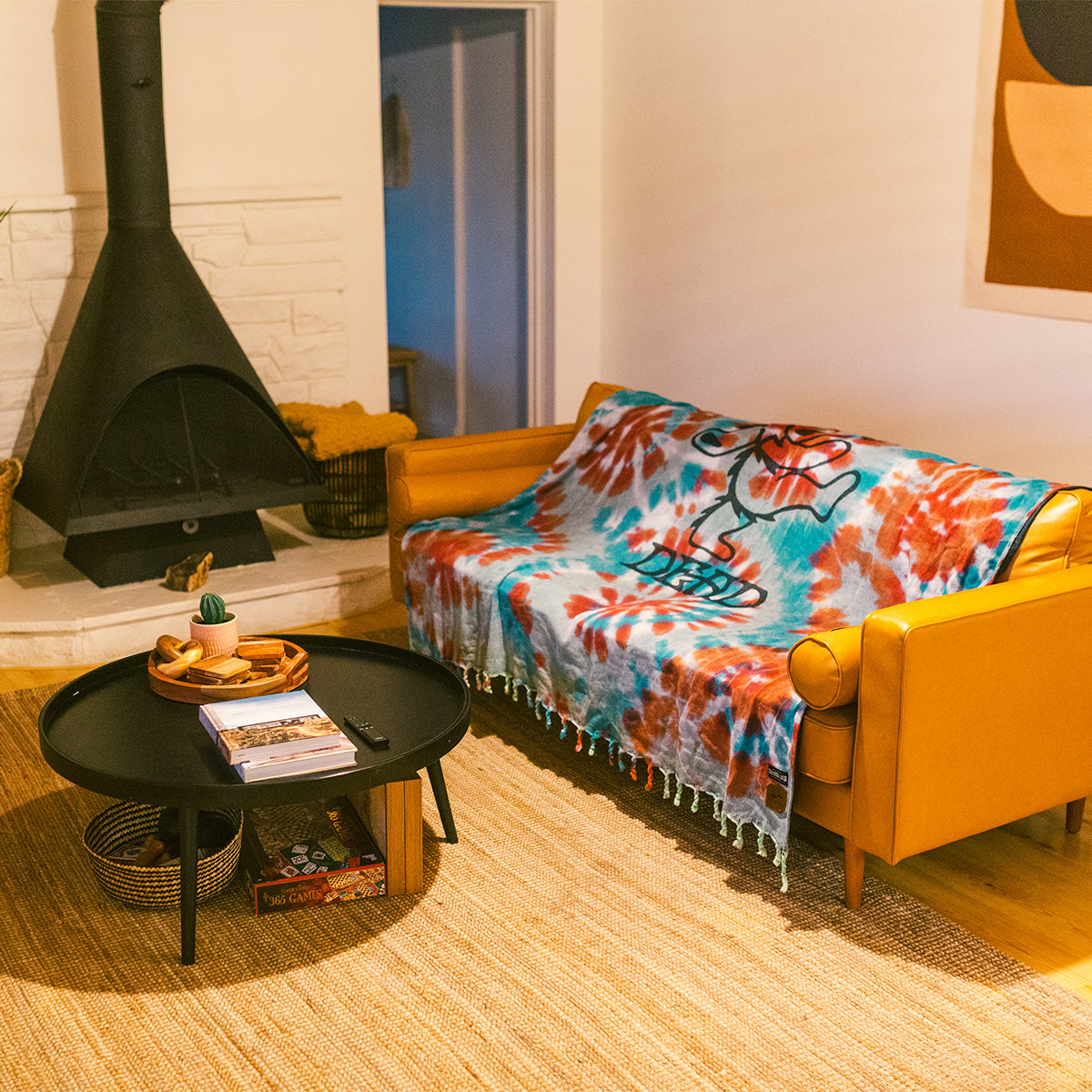 Yellow sofa with sustainable throw in modern living room setting.